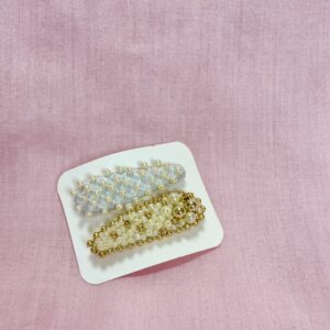 Hiuspinnit – helmillä
